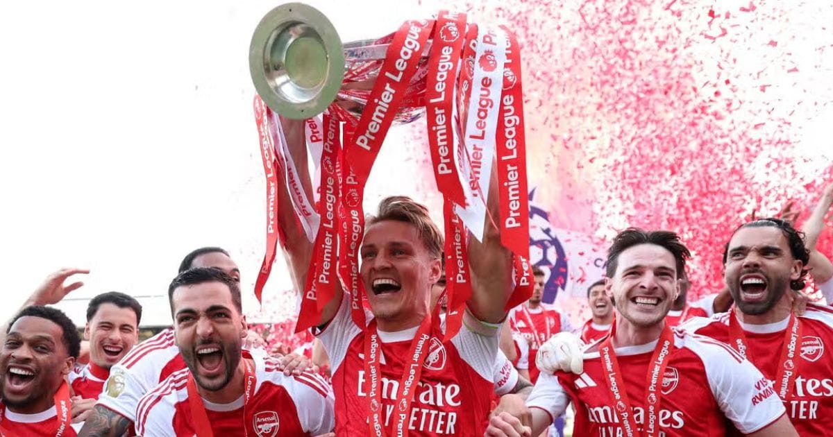 Arsenal players celebrating a victory on the pitch during the 2026 season