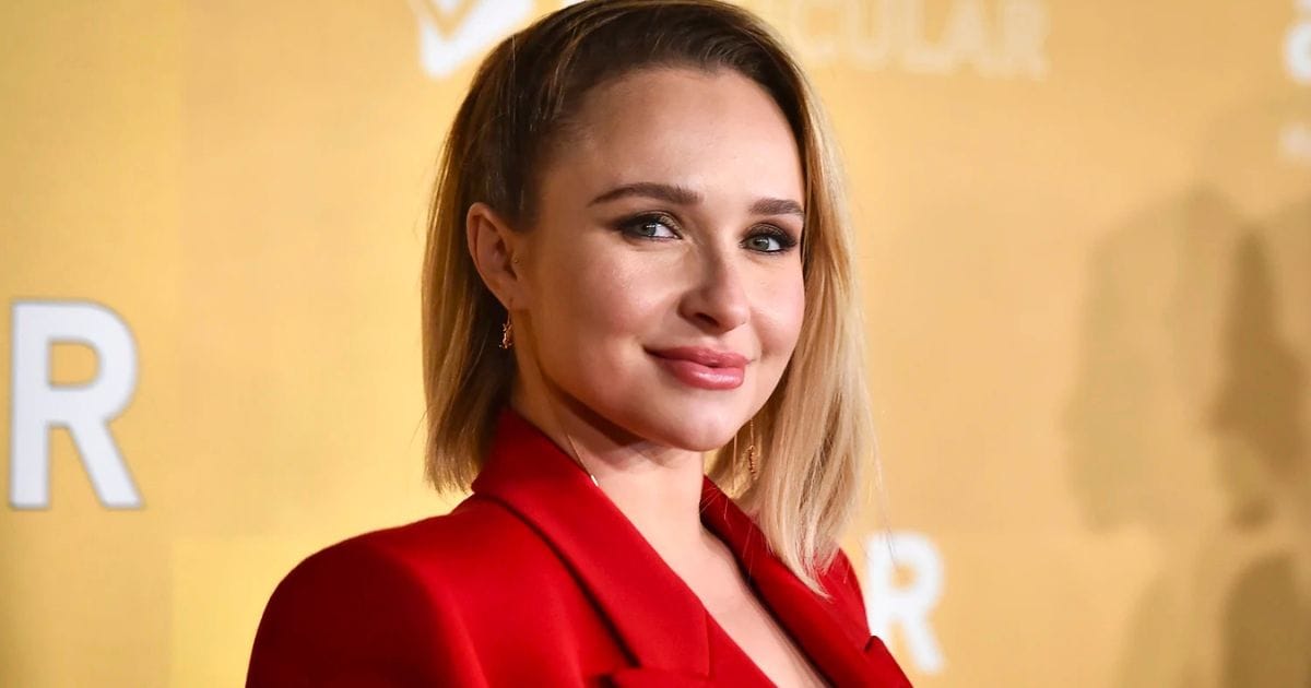 Actress Hayden Panettiere smiling on the red carpet during a public appearance