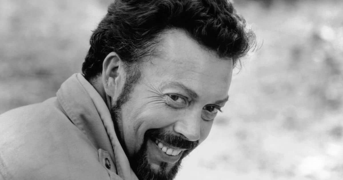 Portrait of legendary actor Tim Curry smiling during his illustrious entertainment career