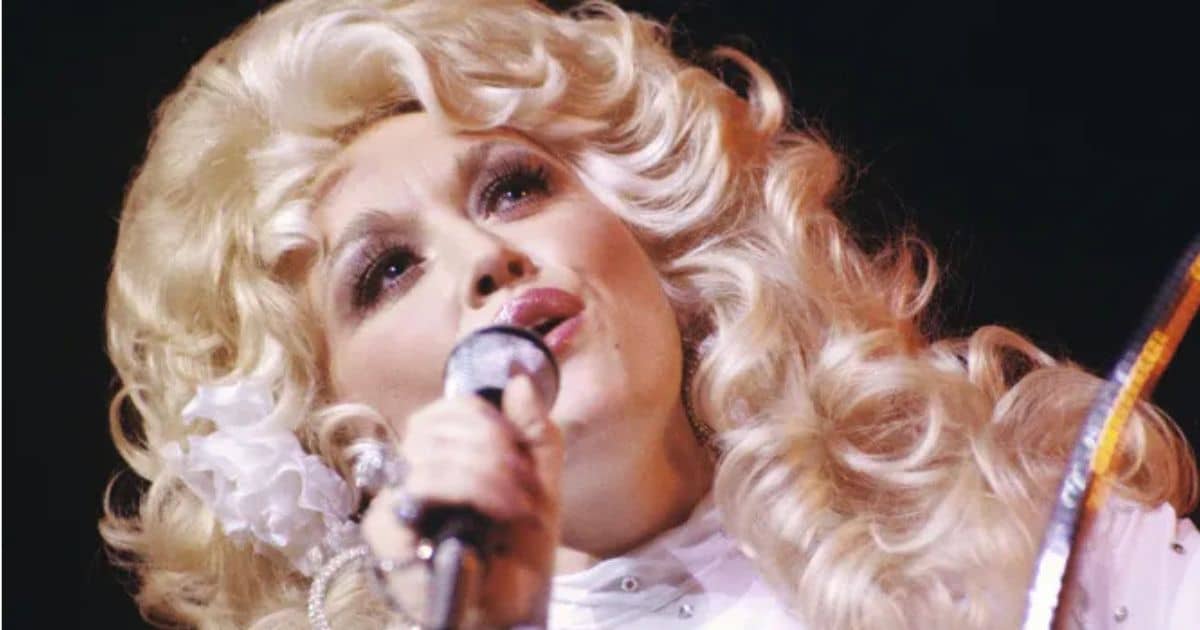 Iconic country music singer and philanthropist Dolly Parton smiling during a performance.