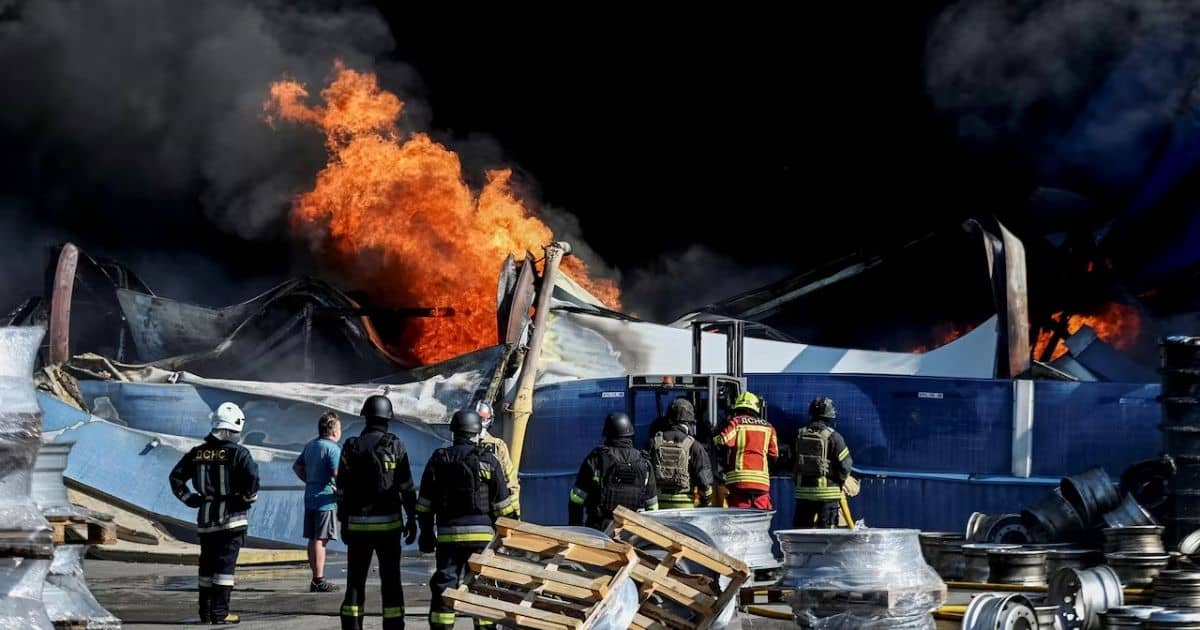 Firefighters at the site of a Russian drone strike near Kyiv - BDUS News 24