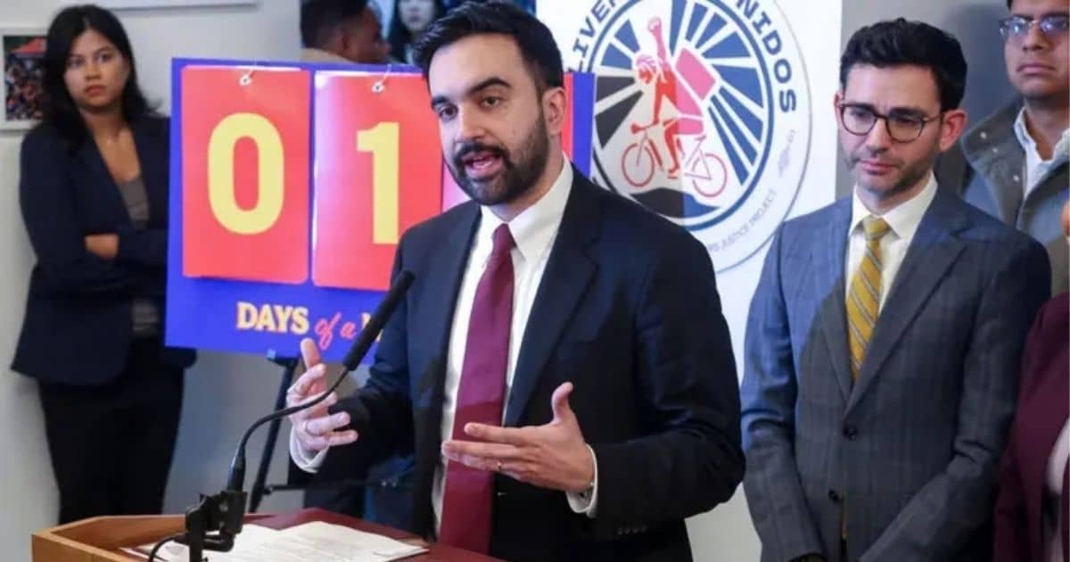 New York City Mayor Zohran Mamdani speaking at a press conference regarding the DoorDash settlement