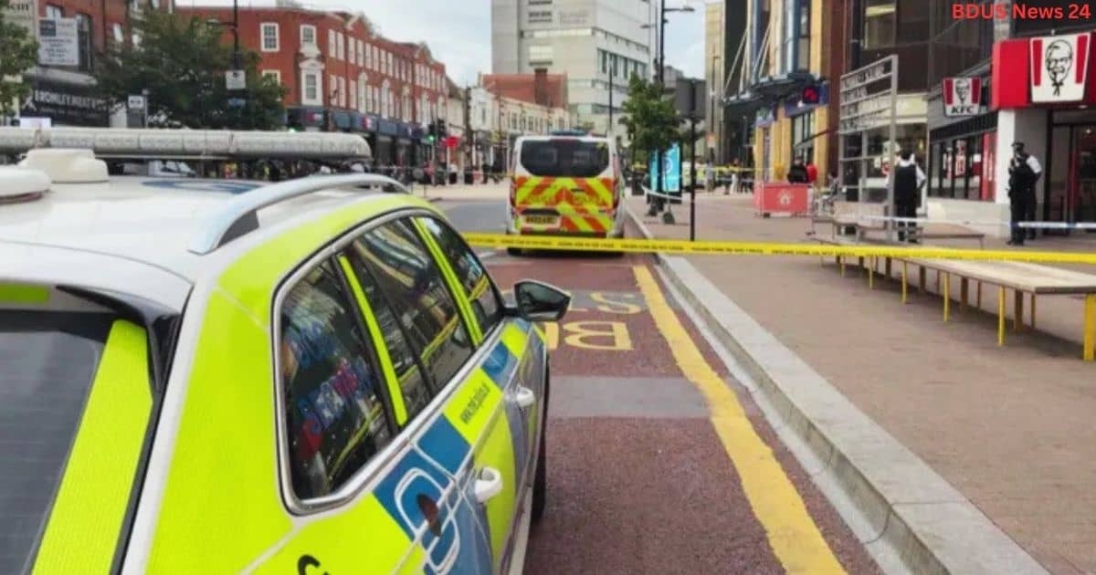 Police cordon and vehicles on Bromley High Street after the stabbing incident