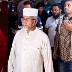 পুলিশের নিরাপত্তায় এমপি গাজী নজরুল ইসলাম ও তার প্রথম স্ত্রী মাকসুদা বেগম