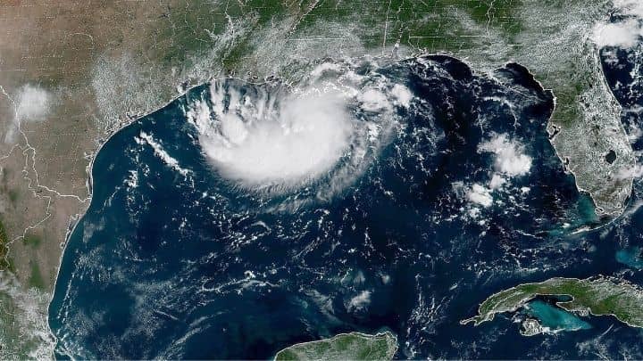 Satellite tracking map showing Tropical Storm Edouard forming over the Gulf of Mexico.
