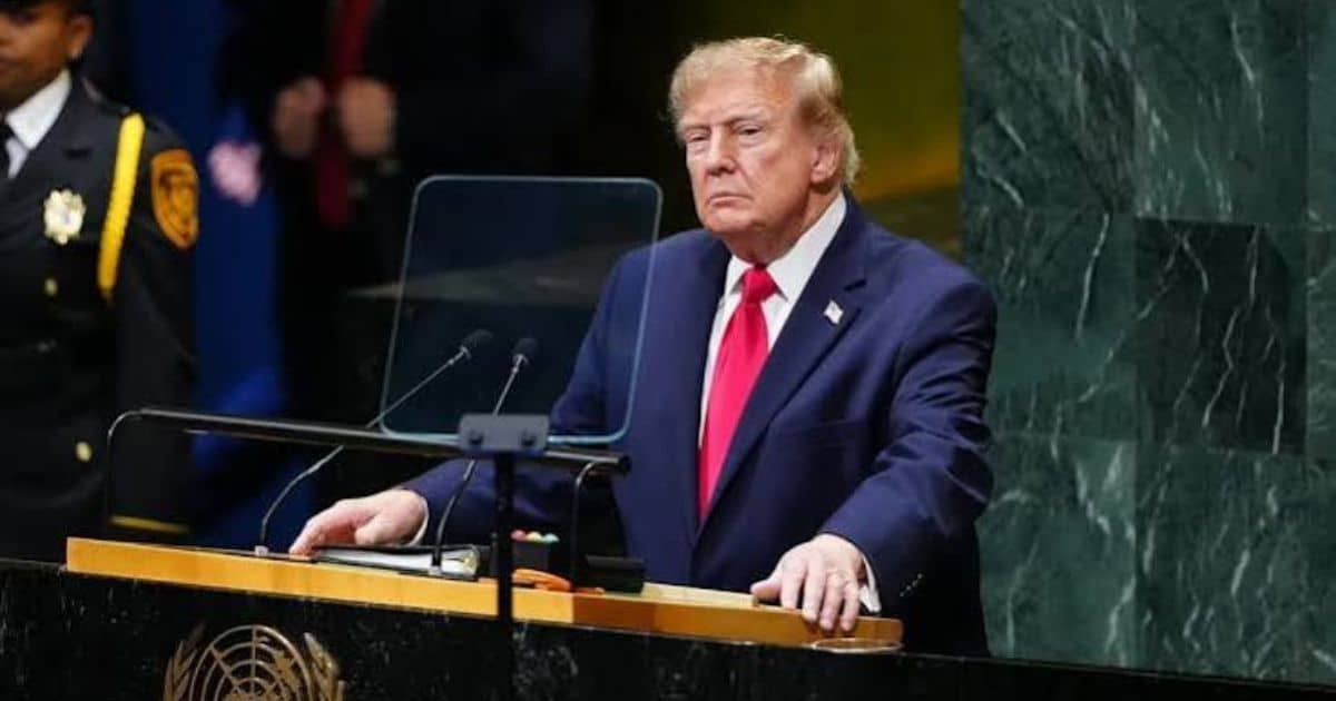 President Donald Trump speaking at a podium