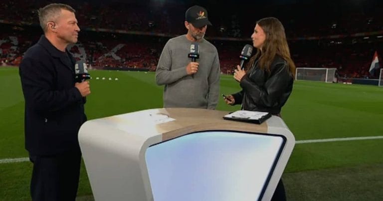 Jurgen Klopp in conversation with moderator Laura Wontorra and expert Lothar Matthaus in the stadium