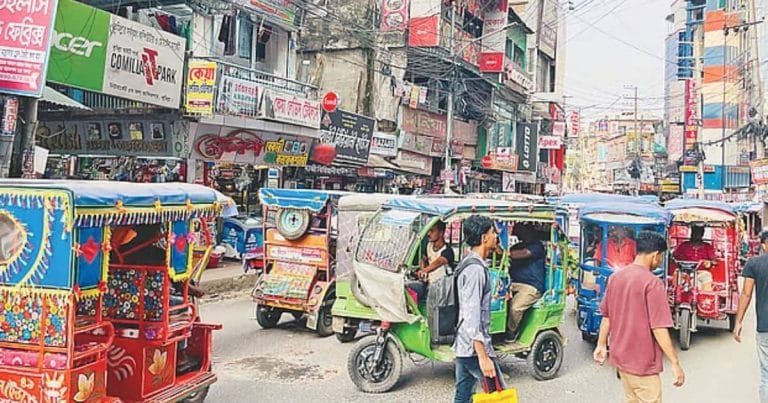 Battery-powered rickshaws and electric easy-bikes causing severe traffic congestion on the crowded streets of Comilla city.