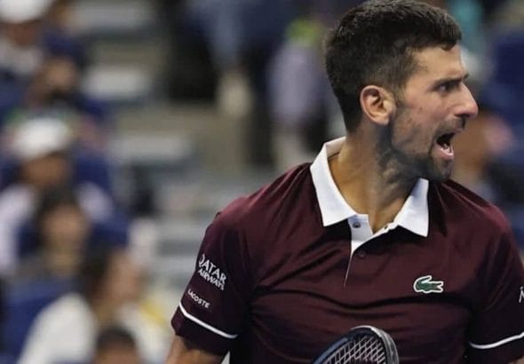 Novak Djokovic reacting on the court during his tennis match against Alexander Zverev.